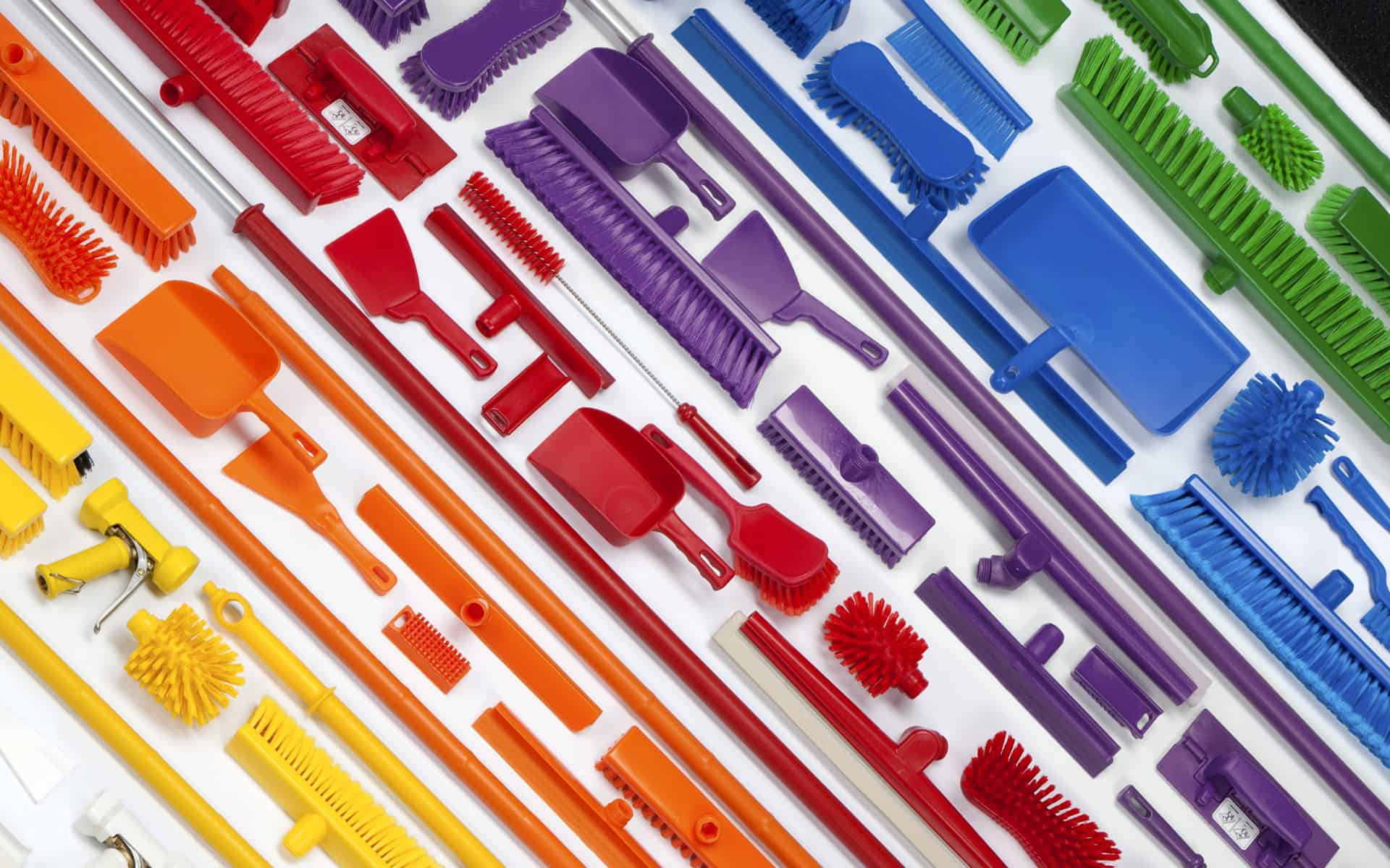 colourful collection of cleaning equipment representing a rainbow pattern